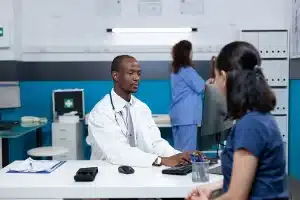 Doctor on a computer