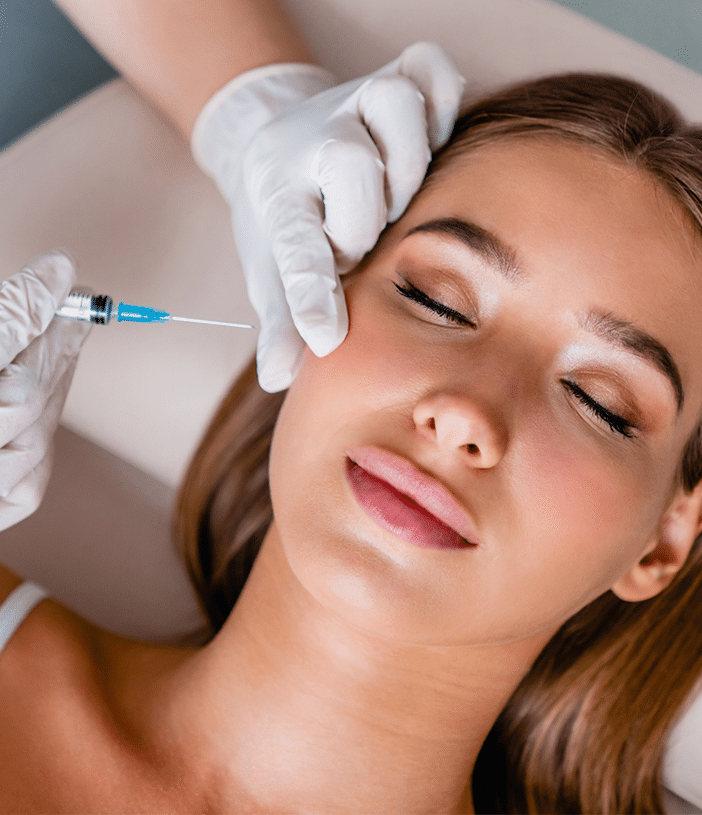 woman getting injected with botox