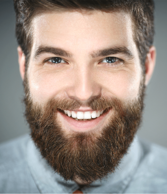 happy man after getting a beard hair transplant