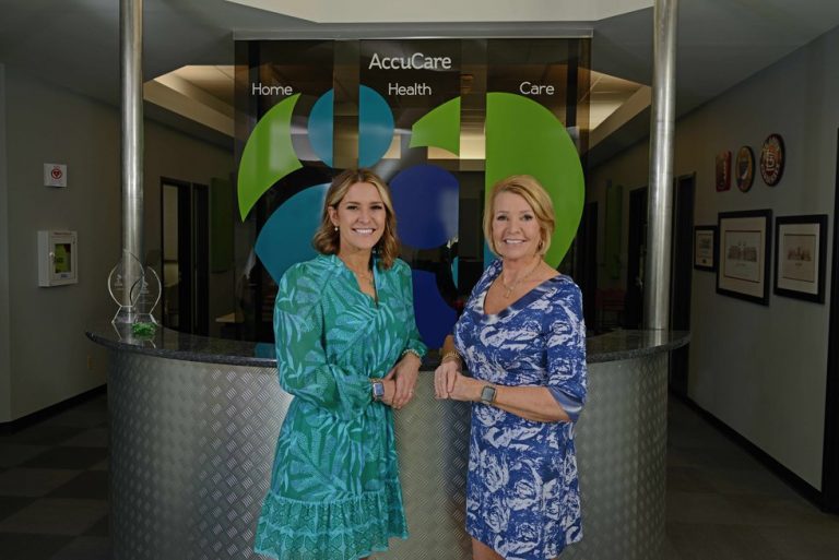 Dana and Jacque posed for a photo at accucare's office.